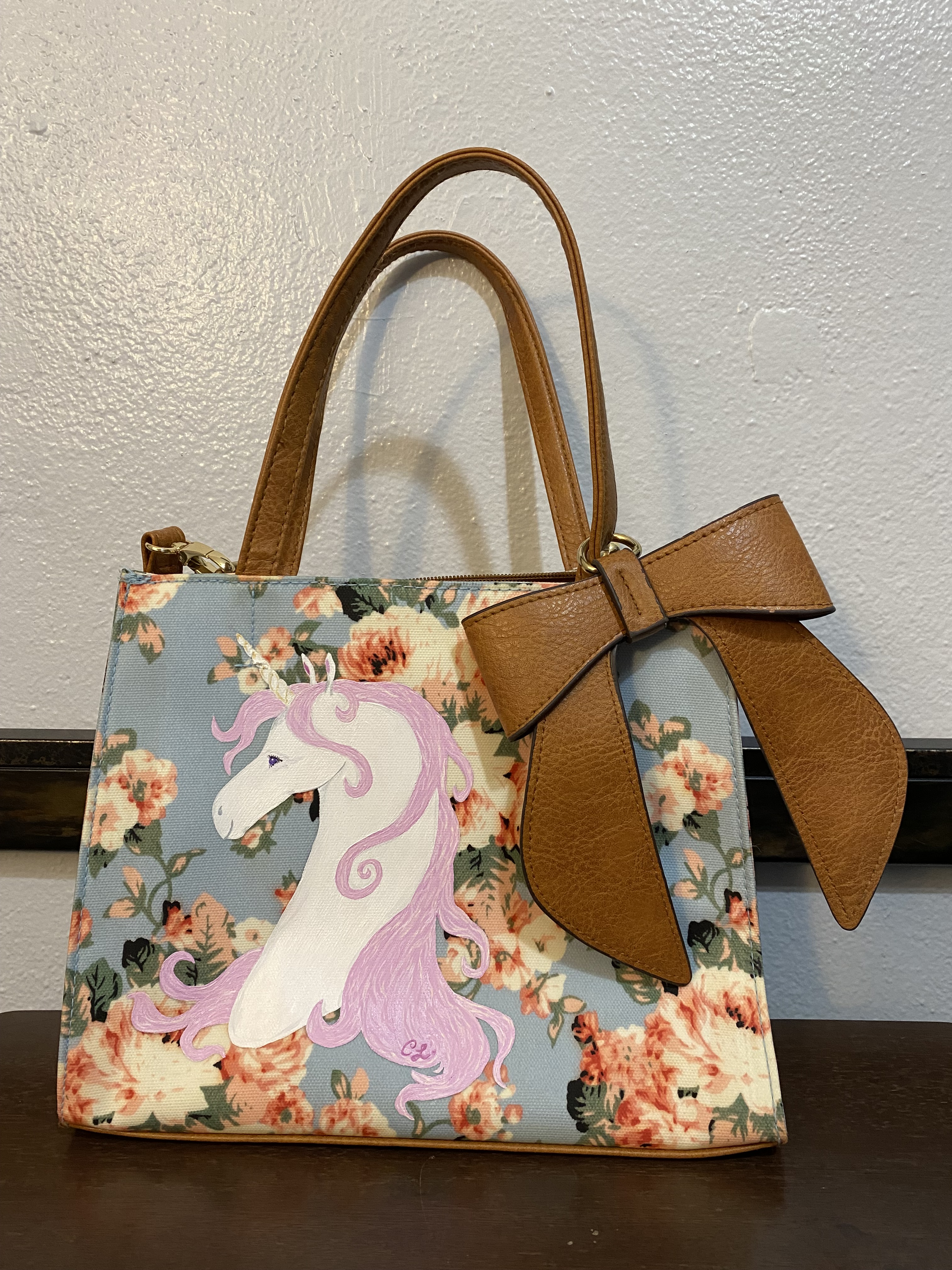 Unicorn painted on purse